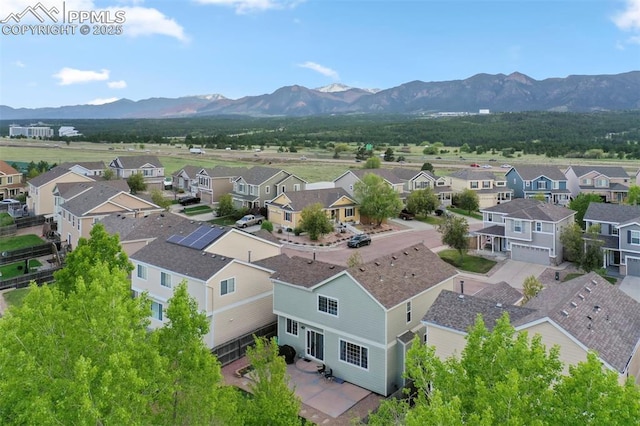 14213 Woodrock Path, Colorado Springs, CO 80921 - aerial view of residential area featuring a mountainous background