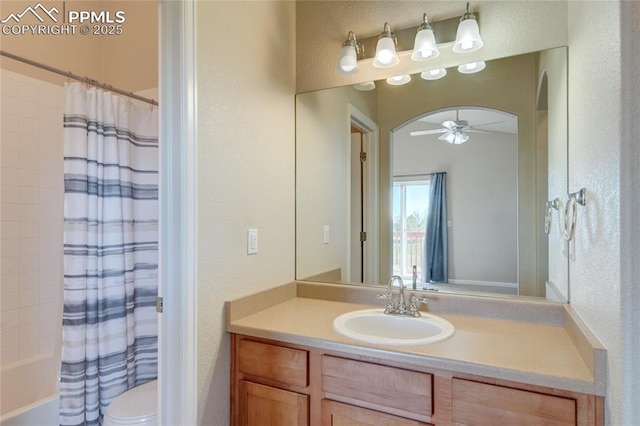 11933 Corbu Hts, Peyton, CO 80831 - full bathroom featuring ceiling fan, toilet, vanity, shower / bath combination with curtain, and a textured wall