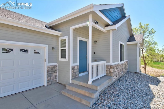 11933 Corbu Hts, Peyton, CO 80831 - view of exterior entry featuring stone siding and an attached garage