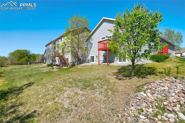 11933 Corbu Hts, Peyton, CO 80831 - back of house with a deck and stairs