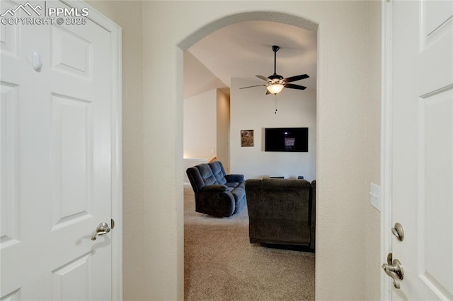11933 Corbu Hts, Peyton, CO 80831 - hallway featuring carpet flooring and arched walkways