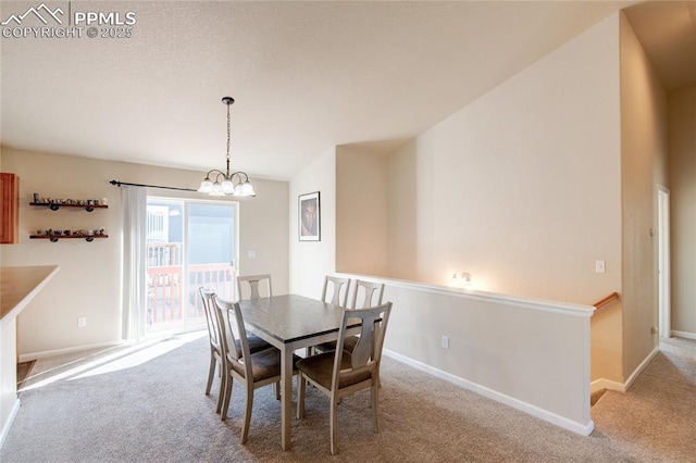 11933 Corbu Hts, Peyton, CO 80831 - dining area with carpet floors, a chandelier, and baseboards