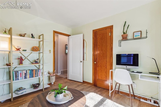 2430 N Tejon St, Colorado Springs, CO 80907 - home office featuring wood finished floors and baseboards