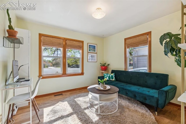 2430 N Tejon St, Colorado Springs, CO 80907 - living room with wood finished floors and baseboards