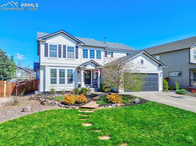 10368 Mount Evans Dr, Peyton, CO 80831 - traditional-style house with concrete driveway and a garage