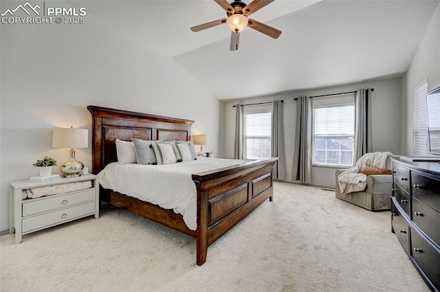 10368 Mount Evans Dr, Peyton, CO 80831 - bedroom featuring vaulted ceiling, multiple windows, light carpet, and ceiling fan