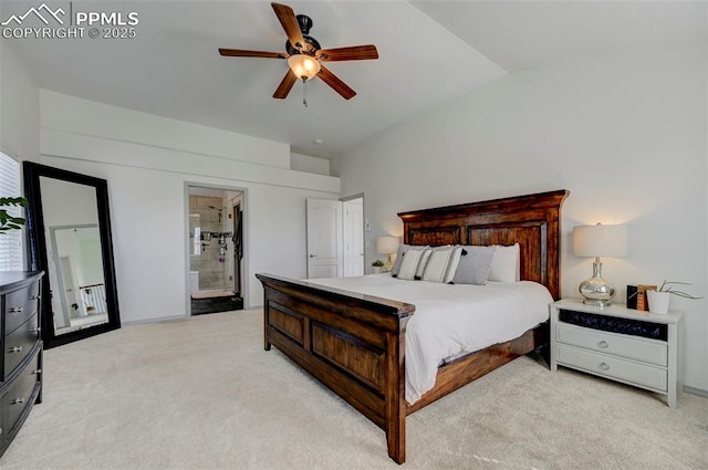10368 Mount Evans Dr, Peyton, CO 80831 - bedroom featuring light carpet, vaulted ceiling, a ceiling fan, and ensuite bathroom