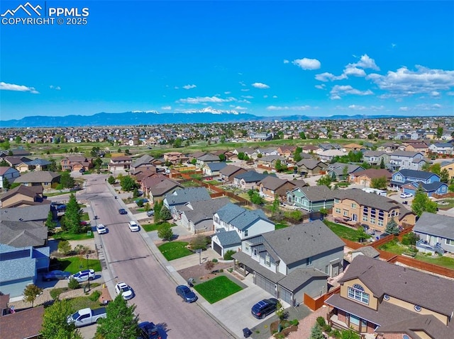 10368 Mount Evans Dr, Peyton, CO 80831 - aerial view of residential area with a mountain backdrop