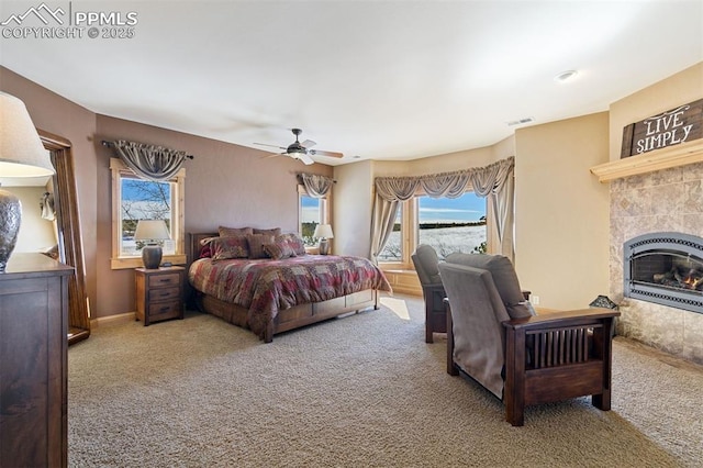 18320 Table Rock Rd, Colorado Springs, CO 80908 - bedroom with heating unit, carpet flooring, multiple windows, and ceiling fan