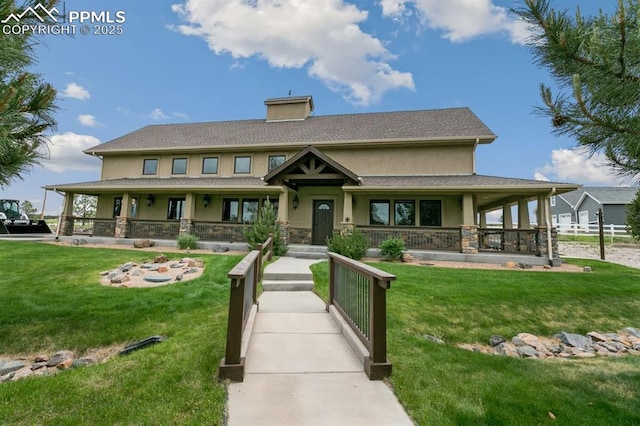 18320 Table Rock Rd, Colorado Springs, CO 80908 - view of front of house featuring a porch, stucco siding, stone siding, and a front lawn
