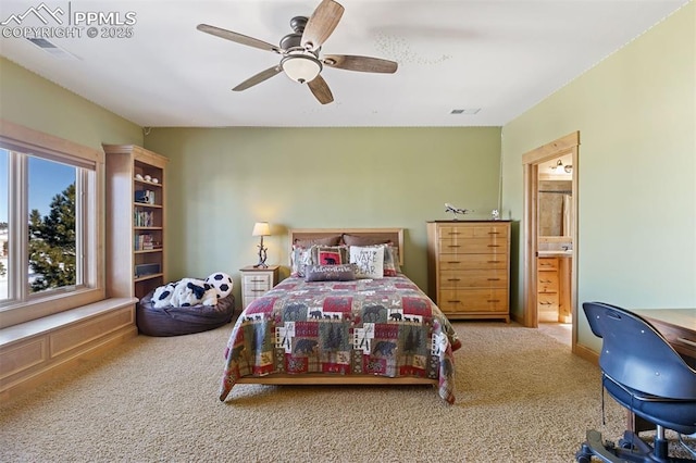 18320 Table Rock Rd, Colorado Springs, CO 80908 - carpeted bedroom with ensuite bath and a ceiling fan