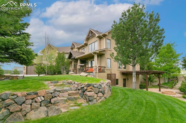 18320 Table Rock Rd, Colorado Springs, CO 80908 - view of front of property featuring stucco siding and a front lawn