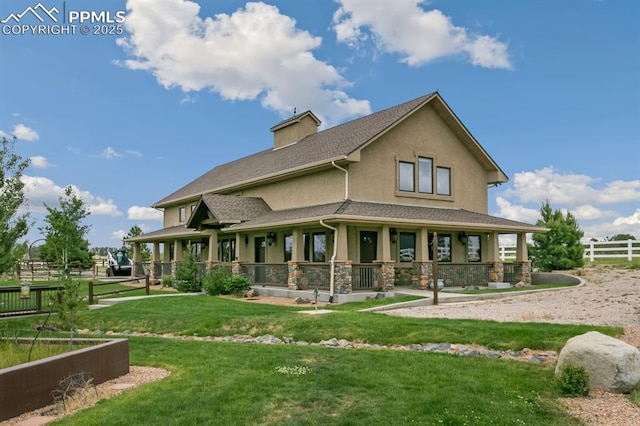 18320 Table Rock Rd, Colorado Springs, CO 80908 - rear view of house with stucco siding, a porch, stone siding, and a chimney