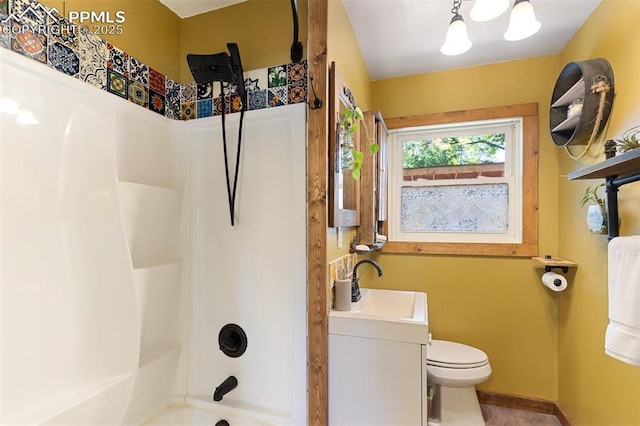 1004 Montrose Ave, Colorado Springs, CO 80905 - full bathroom featuring toilet, vanity, and tub / shower combination