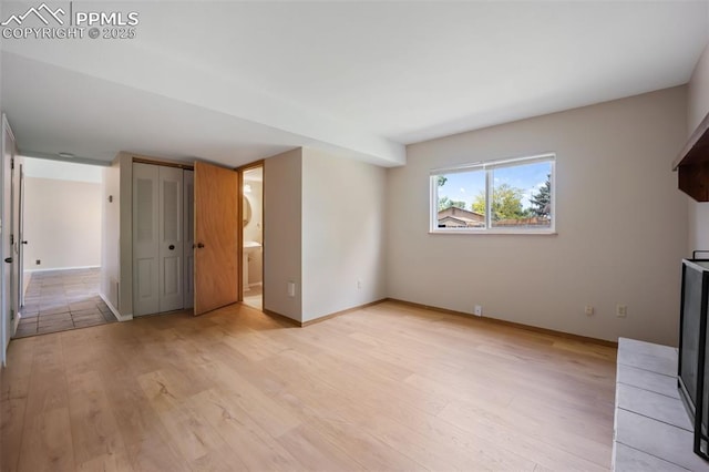 945 Bromefield Dr, Fountain, CO 80817 - unfurnished living room featuring light wood-style floors and baseboards