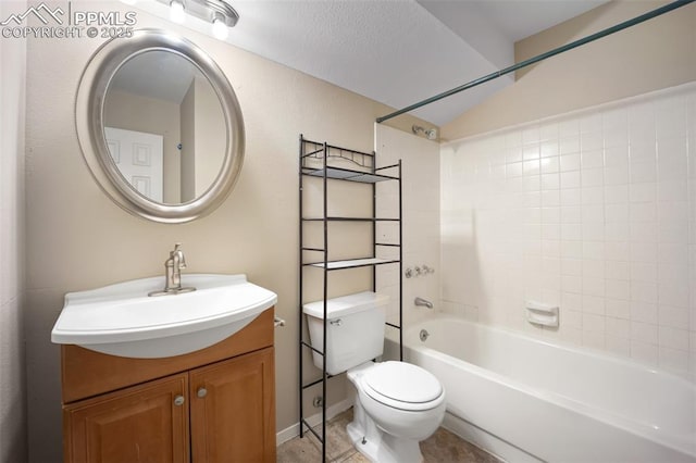 945 Bromefield Dr, Fountain, CO 80817 - full bath with vanity, toilet, shower / bath combination, and lofted ceiling
