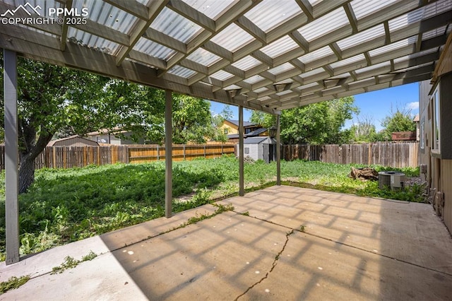 945 Bromefield Dr, Fountain, CO 80817 - fenced backyard with a patio area and cooling unit