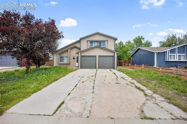 945 Bromefield Dr, Fountain, CO 80817 - view of front of house with driveway and an attached garage
