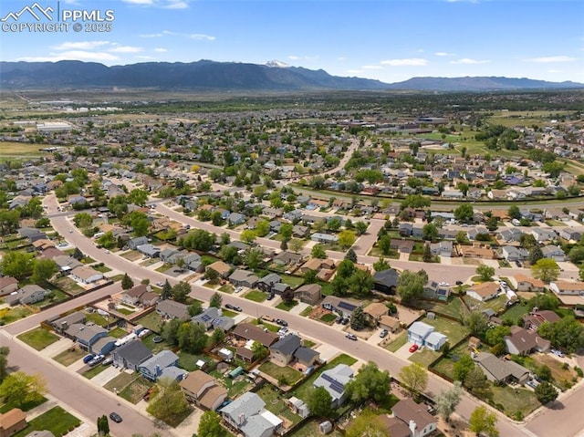 945 Bromefield Dr, Fountain, CO 80817 - aerial overview of property's location with a mountainous background