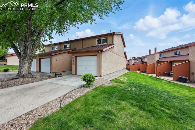 1225 Holland Park Blvd, Colorado Springs, CO 80907 - multi unit property with concrete driveway and stucco siding