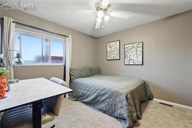 1225 Holland Park Blvd, Colorado Springs, CO 80907 - bedroom with carpet flooring, baseboards, and a ceiling fan