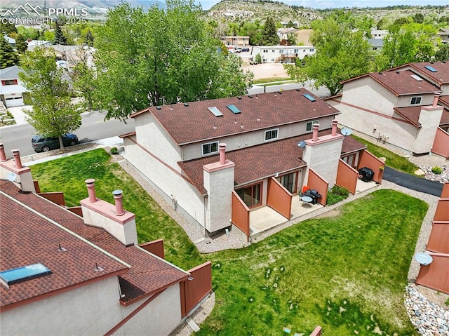1225 Holland Park Blvd, Colorado Springs, CO 80907 - aerial view of residential area featuring a mountainous background