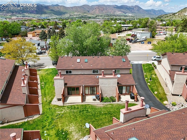 1225 Holland Park Blvd, Colorado Springs, CO 80907 - aerial perspective of suburban area with a mountain backdrop