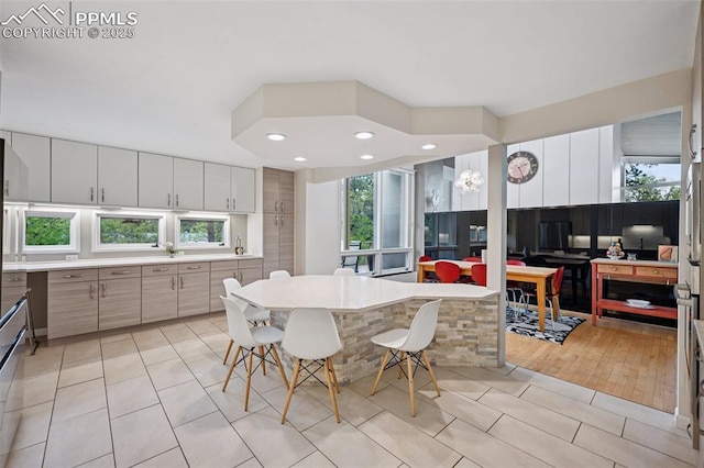 3 Heather Cir, Colorado Springs, CO 80906 - kitchen featuring light tile patterned flooring, light countertops, recessed lighting, and modern cabinets
