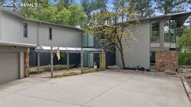 3 Heather Cir, Colorado Springs, CO 80906 - view of front facade with a garage and driveway