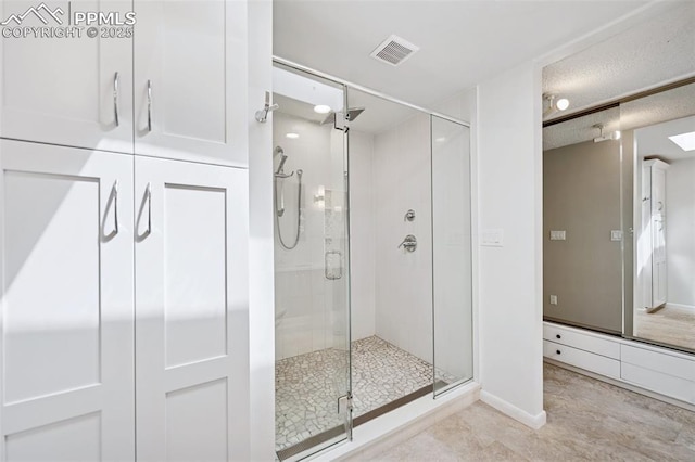 3 Heather Cir, Colorado Springs, CO 80906 - bathroom with a stall shower and baseboards