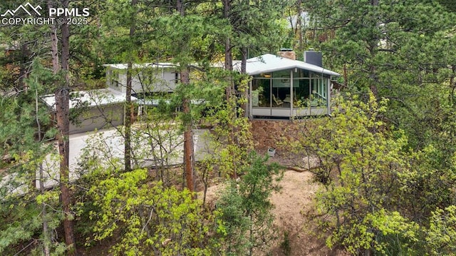 3 Heather Cir, Colorado Springs, CO 80906 - view from above of property with a heavily wooded area