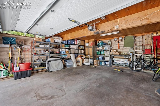 3 Heather Cir, Colorado Springs, CO 80906 - garage featuring a garage door opener