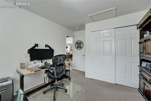 10641 Greenbelt Dr, Peyton, CO 80831 - carpeted home office featuring attic access