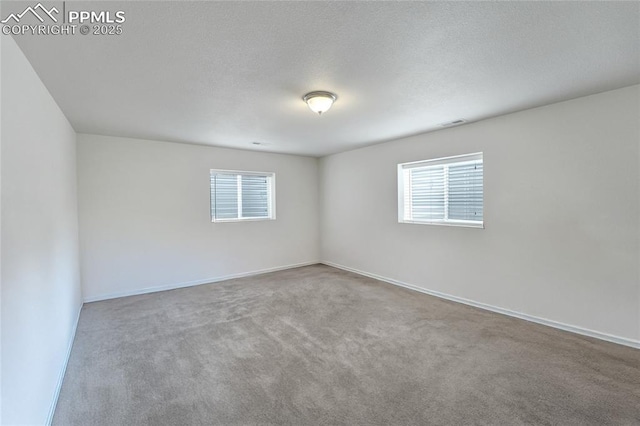 10641 Greenbelt Dr, Peyton, CO 80831 - empty room featuring carpet floors and baseboards