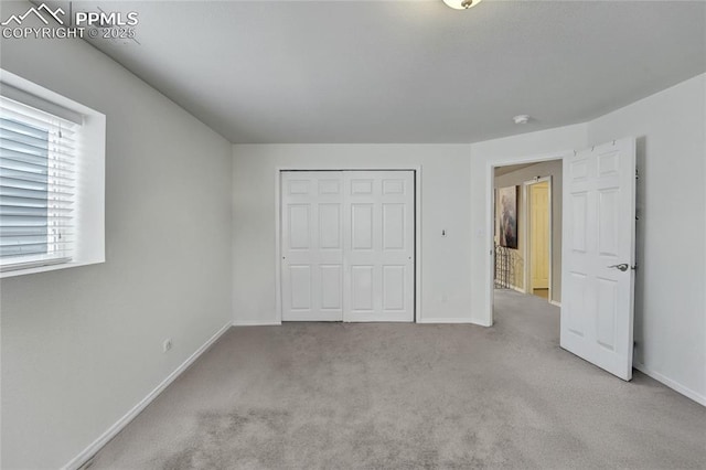 10641 Greenbelt Dr, Peyton, CO 80831 - unfurnished bedroom featuring carpet, baseboards, and a closet