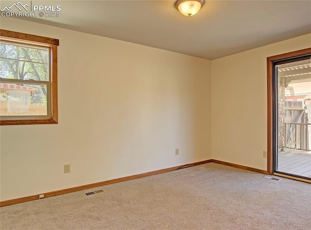 20 Swope Ave, Colorado Springs, CO 80909 - carpeted spare room with baseboards