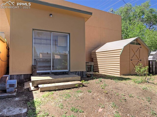 20 Swope Ave, Colorado Springs, CO 80909 - rear view of house featuring stucco siding