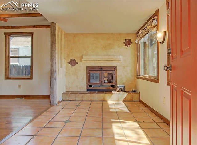 20 Swope Ave, Colorado Springs, CO 80909 - unfurnished living room featuring plenty of natural light and baseboards