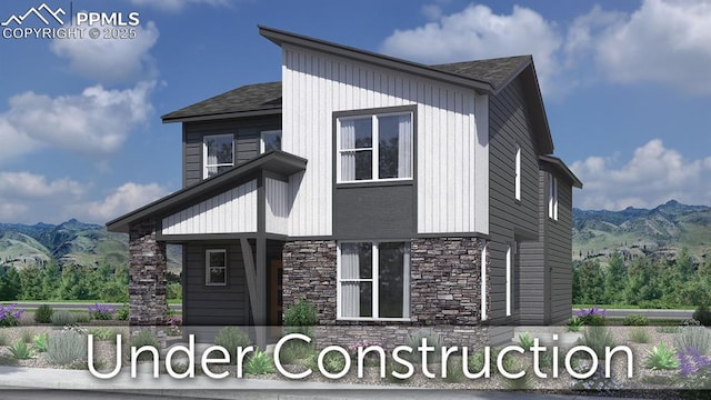 3588 Greenways Main Blvd, Colorado Springs, CO 80922 - view of side of home featuring stone siding and a mountain view