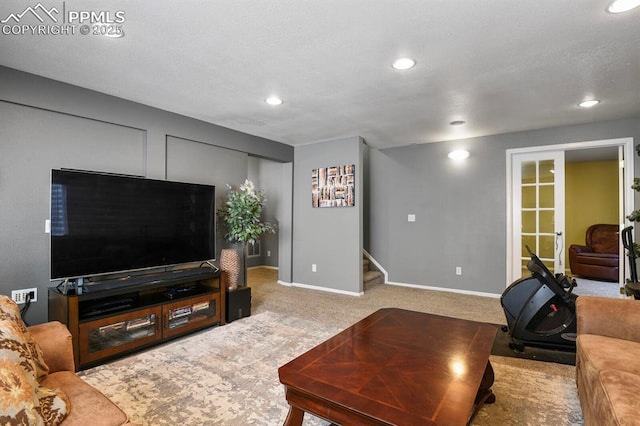 6557 Many Moon Dr, Colorado Springs, CO 80923 - living room with stairs, baseboards, carpet, and recessed lighting