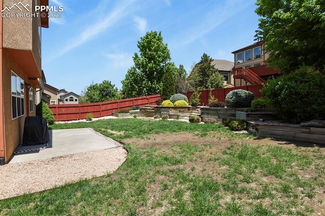 6557 Many Moon Dr, Colorado Springs, CO 80923 - view of yard featuring a patio