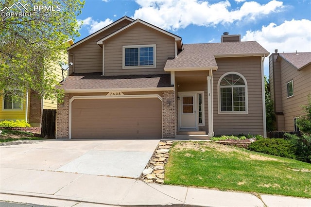 7435 Julynn Rd, Colorado Springs, CO 80919 - traditional-style home with a garage, concrete driveway, a chimney, a shingled roof, and brick siding