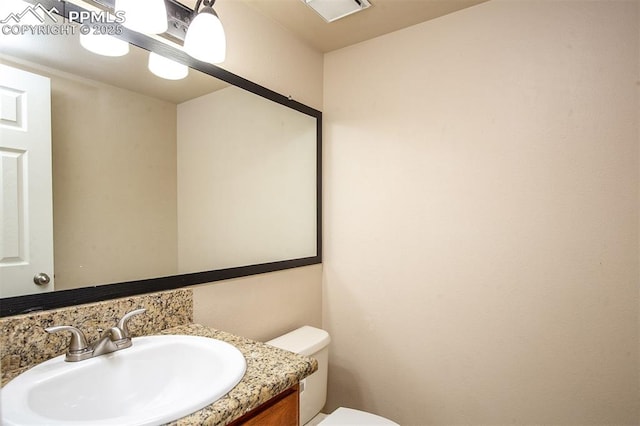 7435 Julynn Rd, Colorado Springs, CO 80919 - bathroom with toilet and vanity