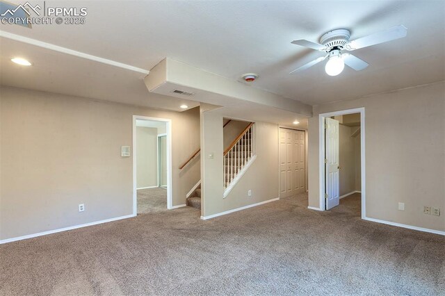 7435 Julynn Rd, Colorado Springs, CO 80919 - empty room with a ceiling fan, carpet flooring, stairs, and baseboards