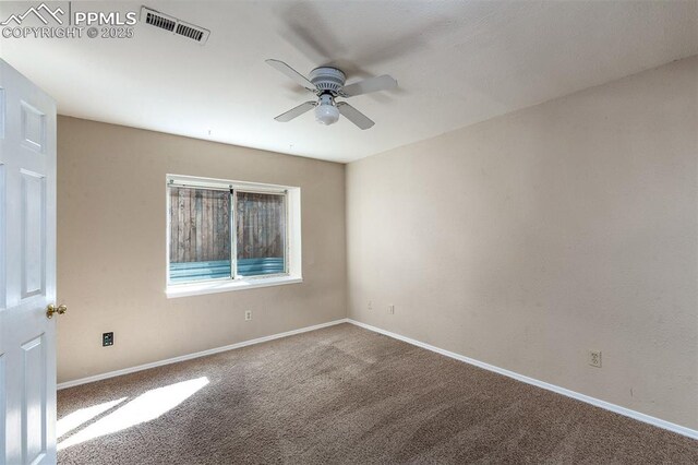 7435 Julynn Rd, Colorado Springs, CO 80919 - carpeted spare room with a ceiling fan and baseboards