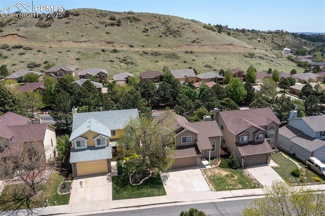 7435 Julynn Rd, Colorado Springs, CO 80919 - aerial view of residential area with a mountain backdrop
