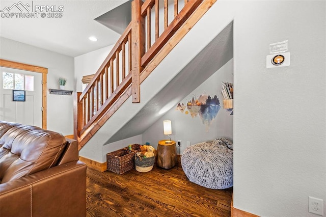 404 S Willow St, Woodland Park, CO 80863 - living area featuring wood finished floors, stairs, and recessed lighting