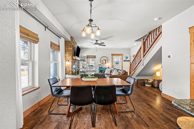 404 S Willow St, Woodland Park, CO 80863 - dining room featuring wood finished floors, ceiling fan, stairs, and baseboards