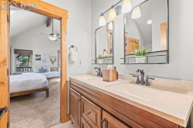 404 S Willow St, Woodland Park, CO 80863 - ensuite bathroom with double vanity, ceiling fan, and high vaulted ceiling
