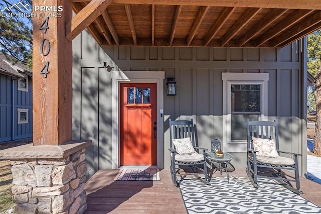 404 S Willow St, Woodland Park, CO 80863 - doorway to property with board and batten siding